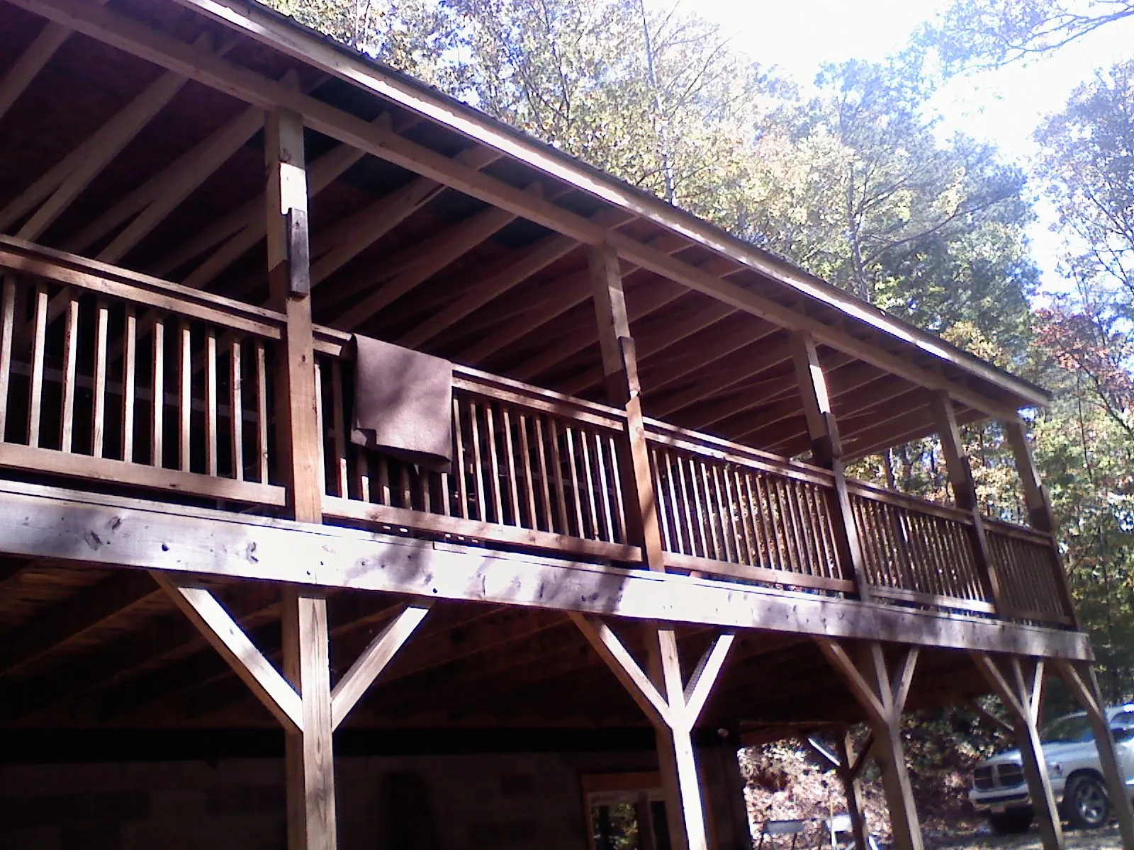Timber framing under a new elevated porch and deck — Roof Leak Repair in Drakesboro by Roofing Brothers